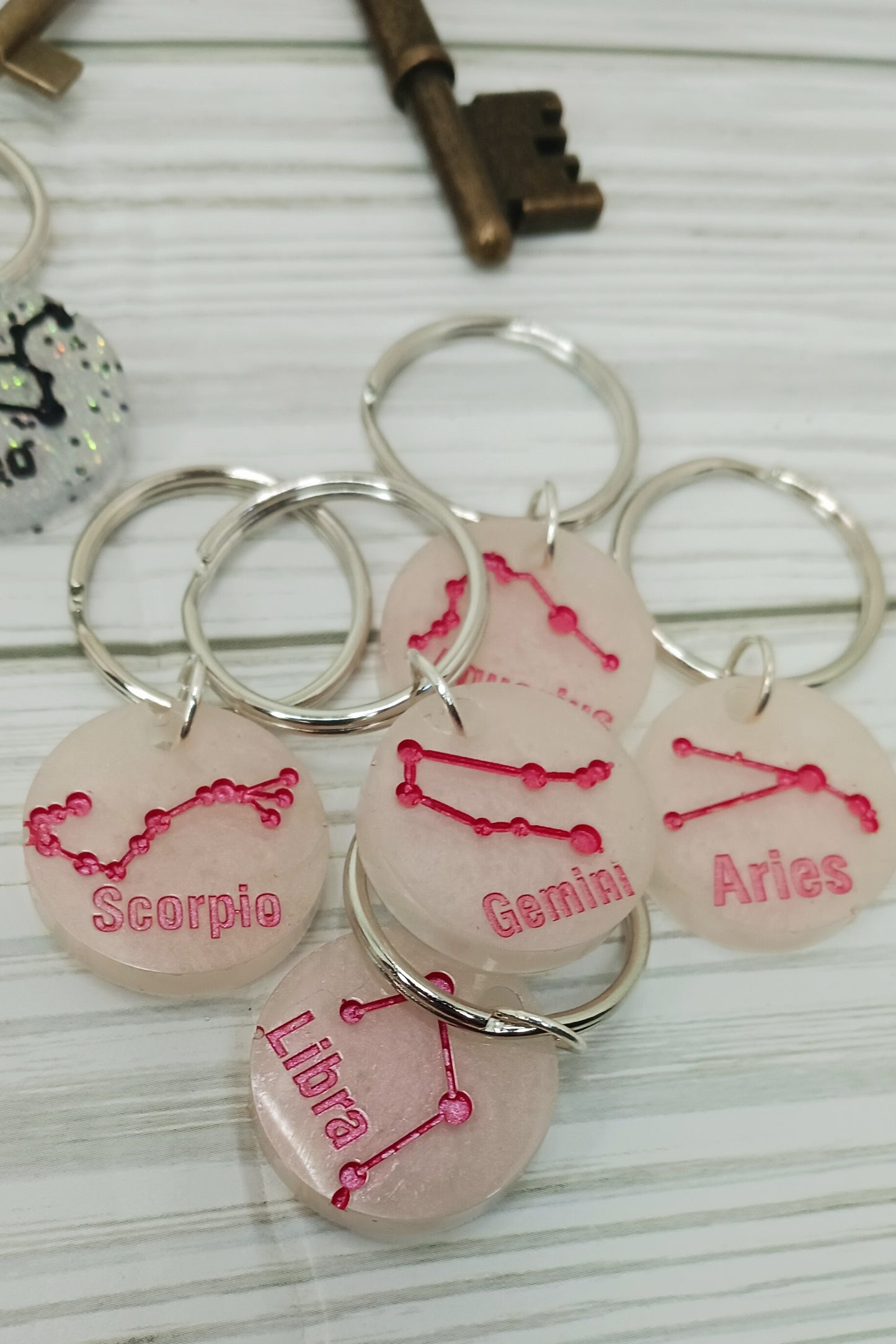 White and Red Resin Zodiac Keychains