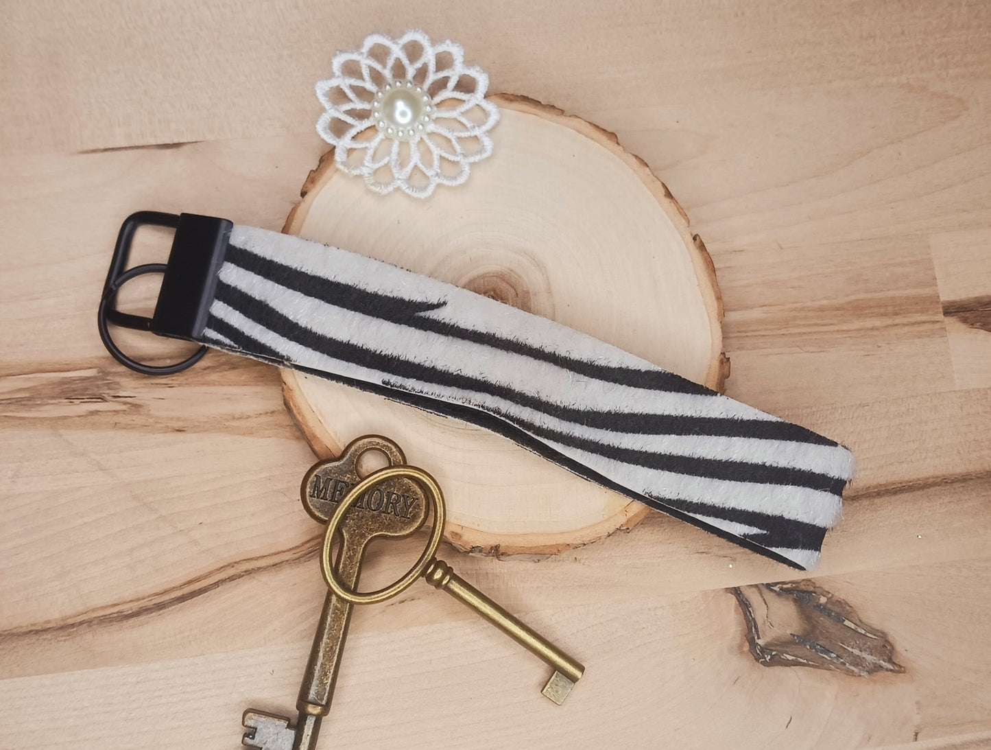 Fuzzy Zebra Print Faux Leather Wristlet Keychain